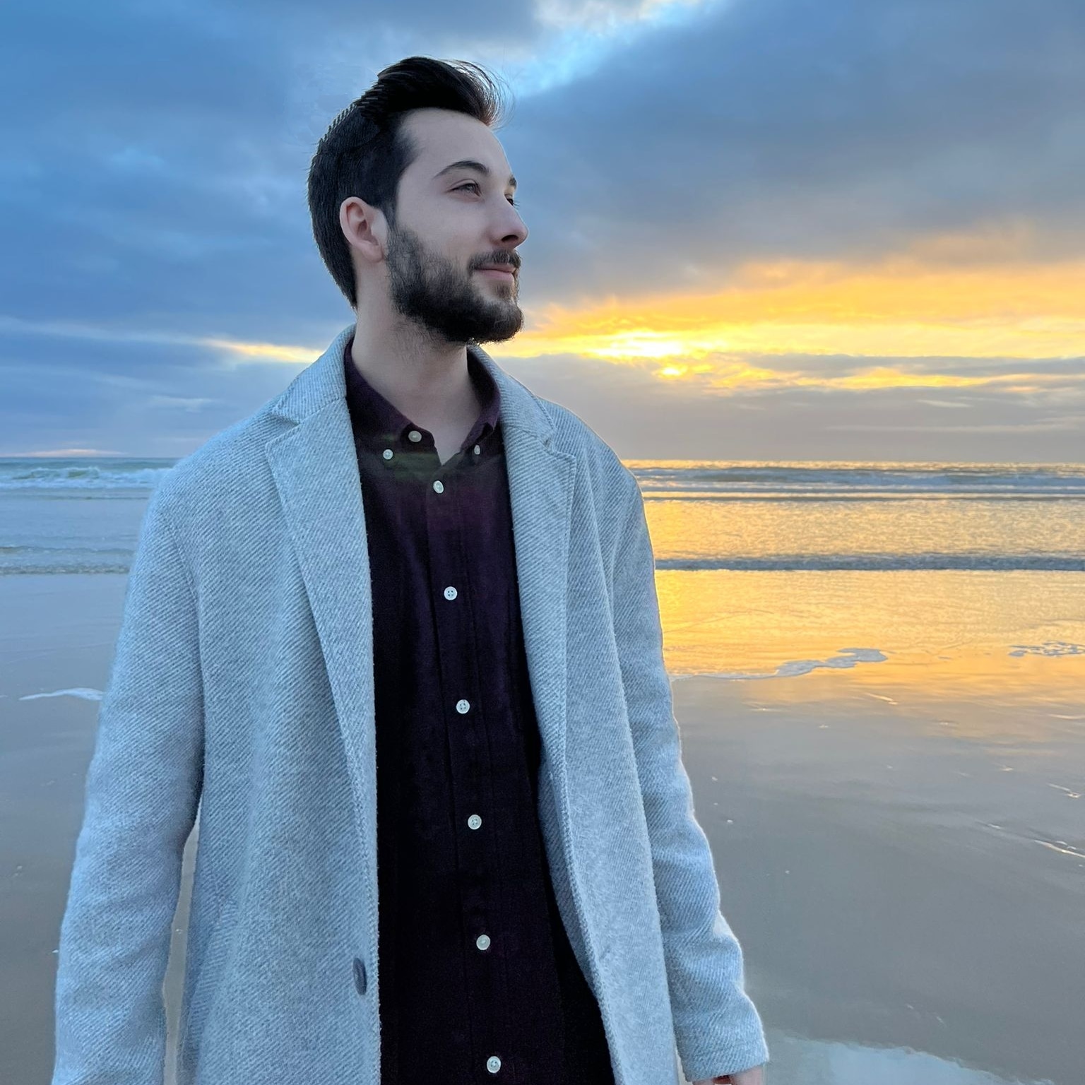 Ricardo Silva by the sea at sunset